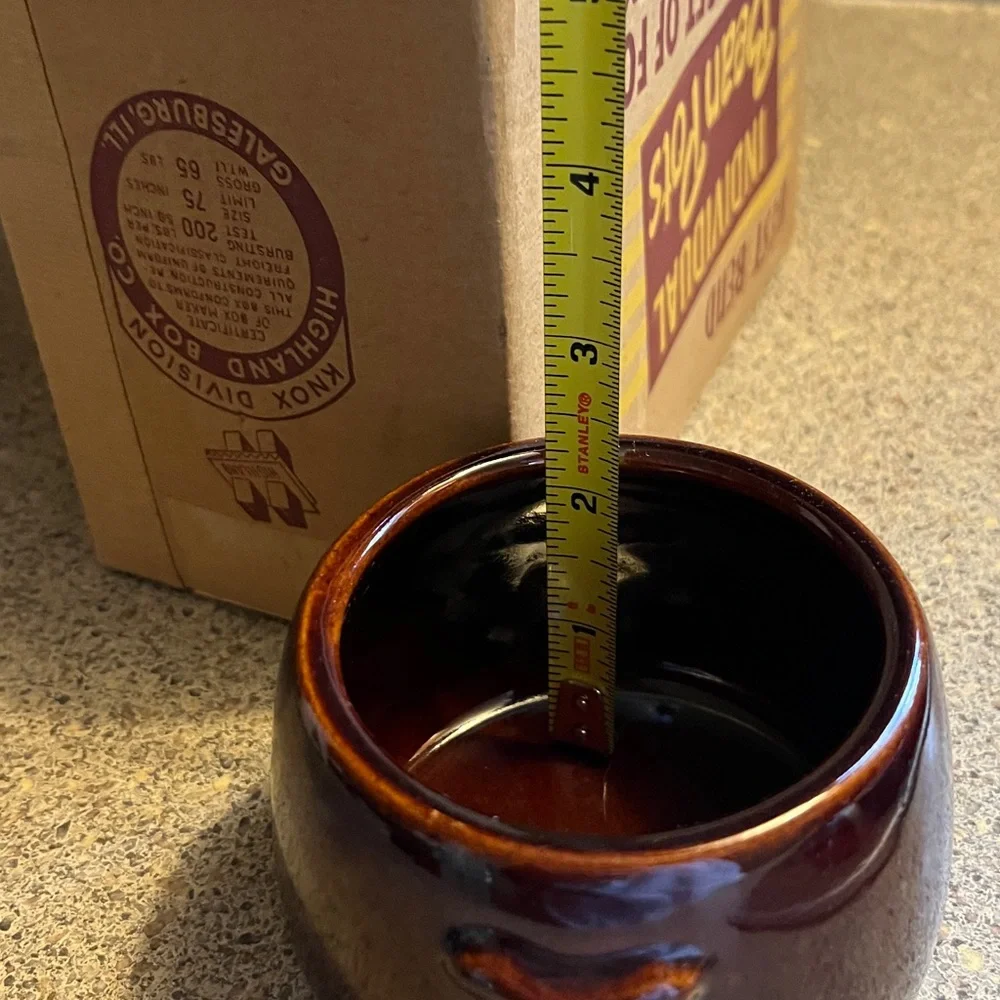 Vintage set of four West Bend bean pots. No. 5.109 with original box.
